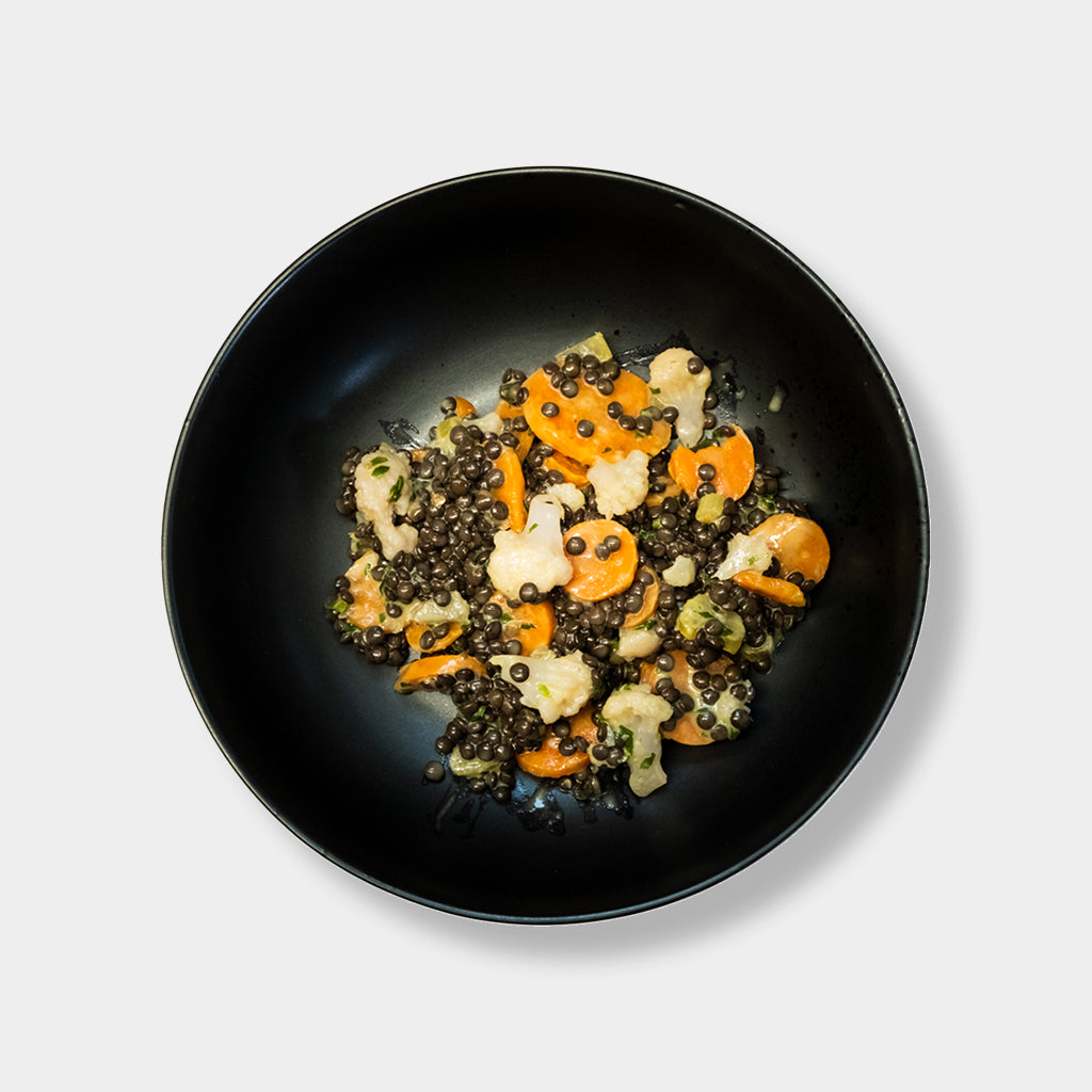 Beluga-Linsensalat in Senfvinaigrette